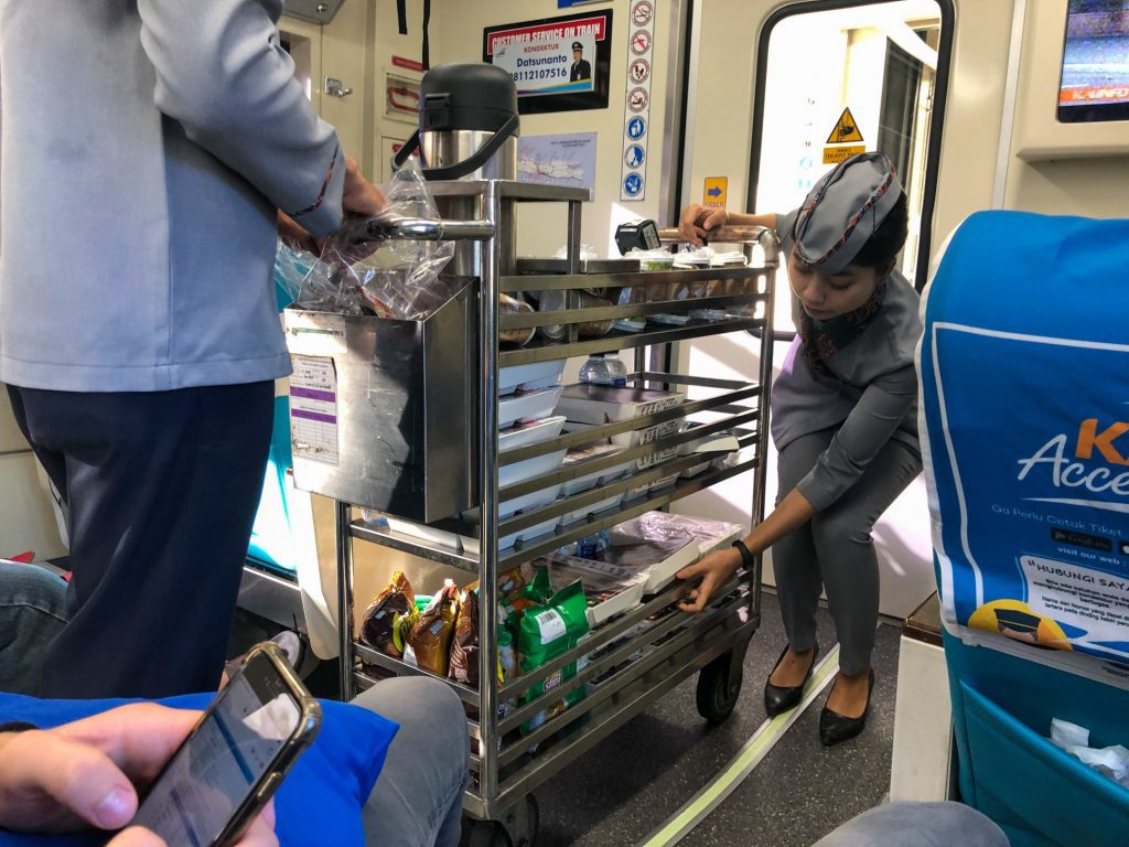 Indonesia train executive class food cart dining snacks 