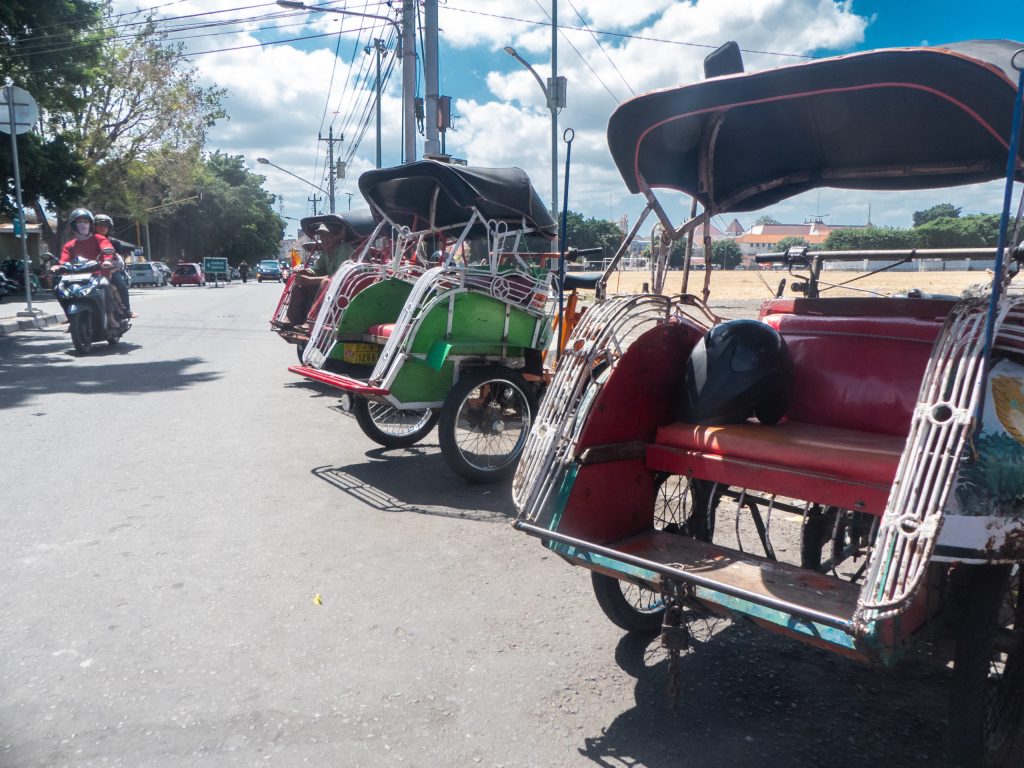 tuk tuks yogyakarta standing on the street