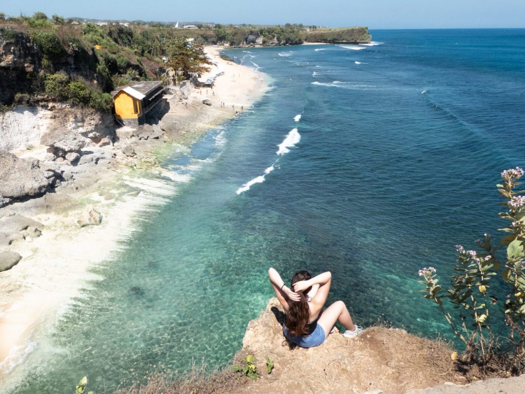 balangan beach lookout point girl sitting