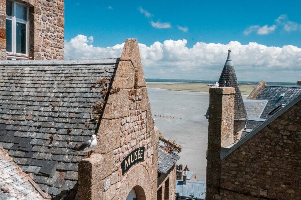 castle with musee written on it with ocean view