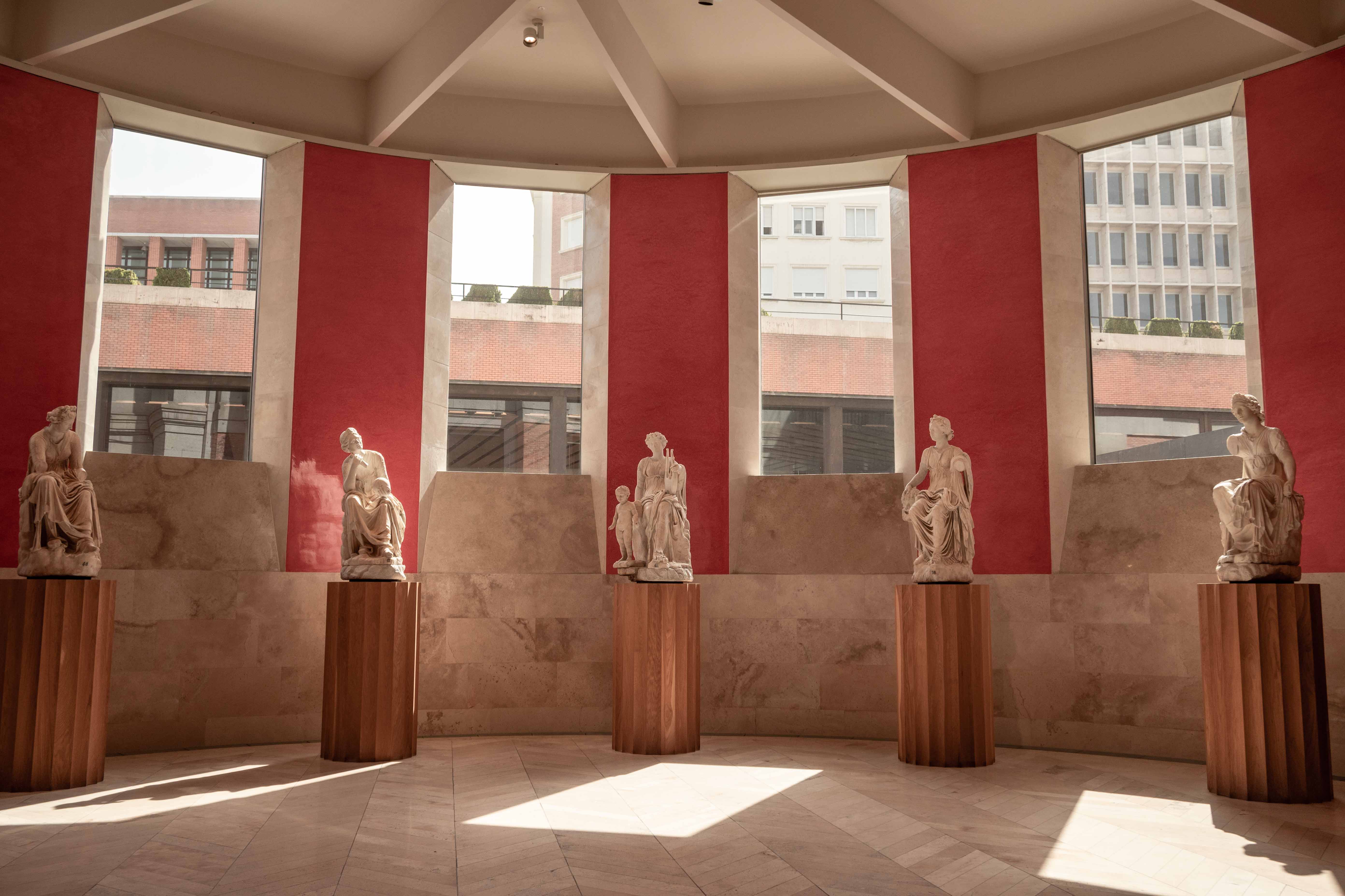 Prado Madrid red Statues Art museum interior inside