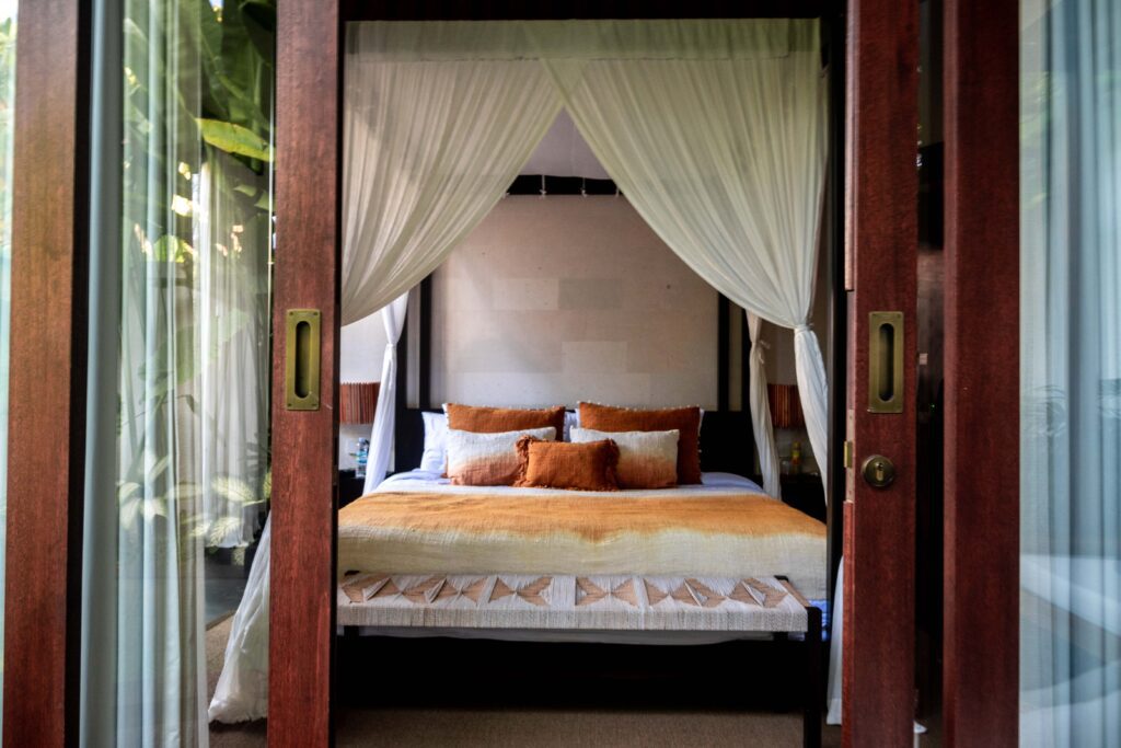 Bed orange Uma Kalai pool suite villa Ubud Bali