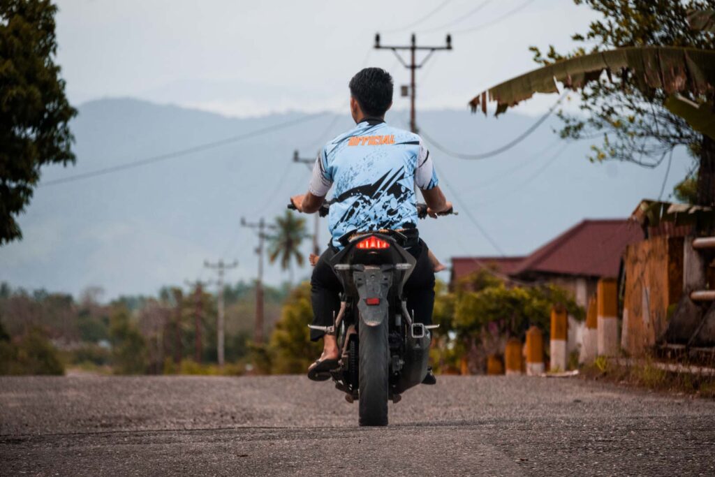 local indonesian motor bike bada valley sulawesi travel