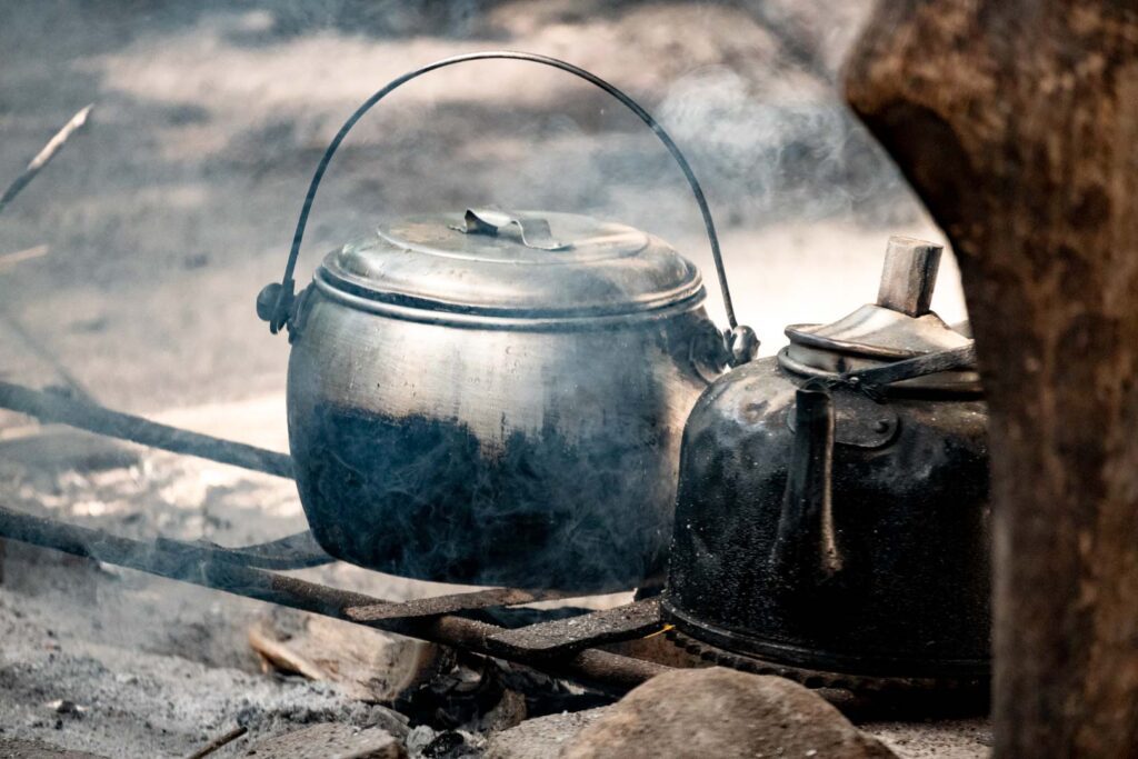 traditionall cooking above fire tee pot central sulawesi travel