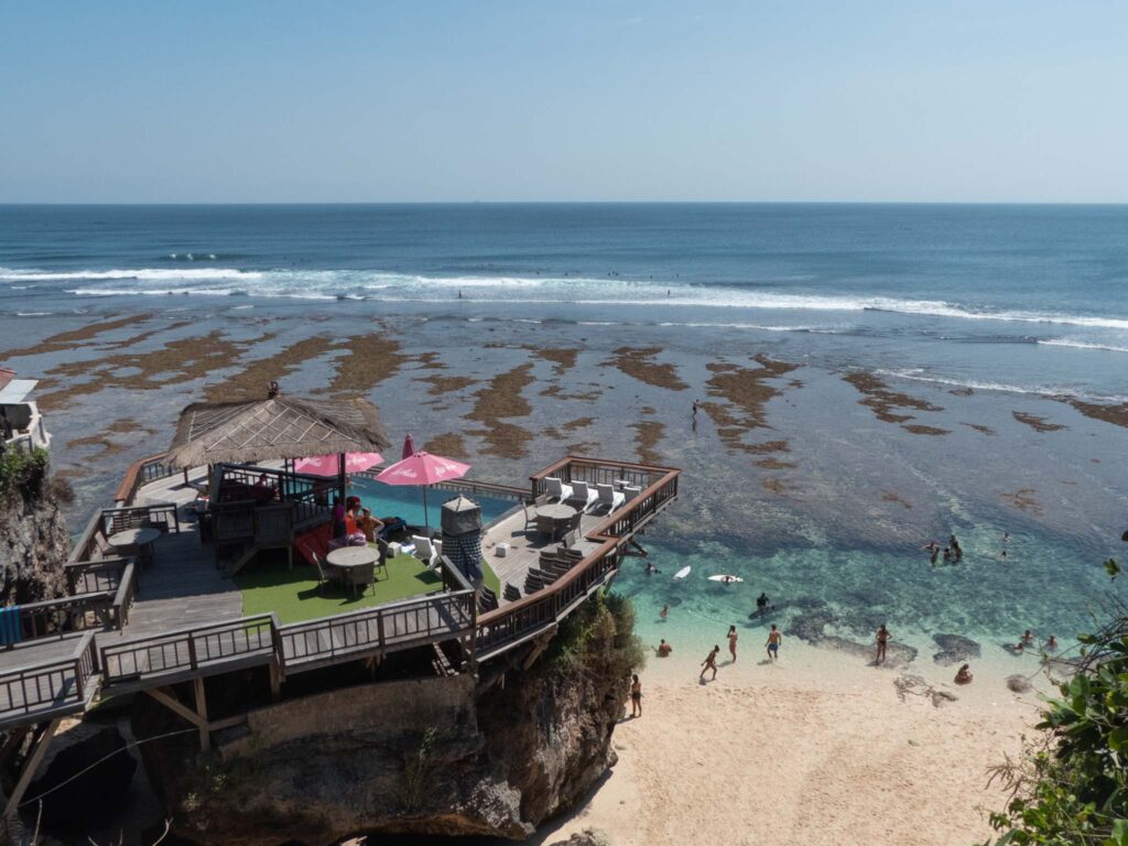 Uluwatu single finn bali Indonesia beach low tide cliff pool