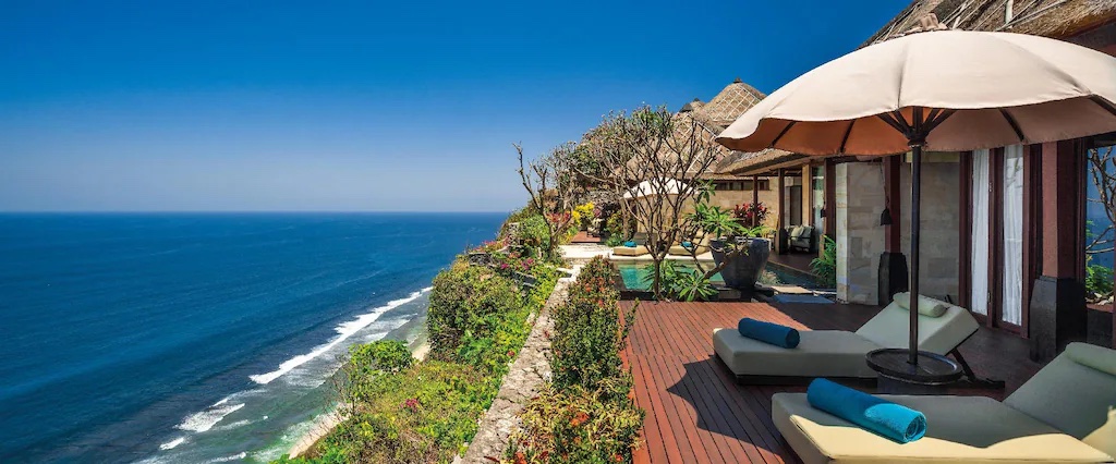 Bulgari Resort Bali uluwatu beach accommodation umbrella cliff