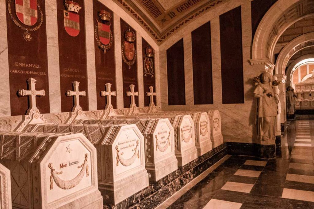 Crypt of San Lorenzo de El Escorial with sarcophaguses and burial of royal family members 