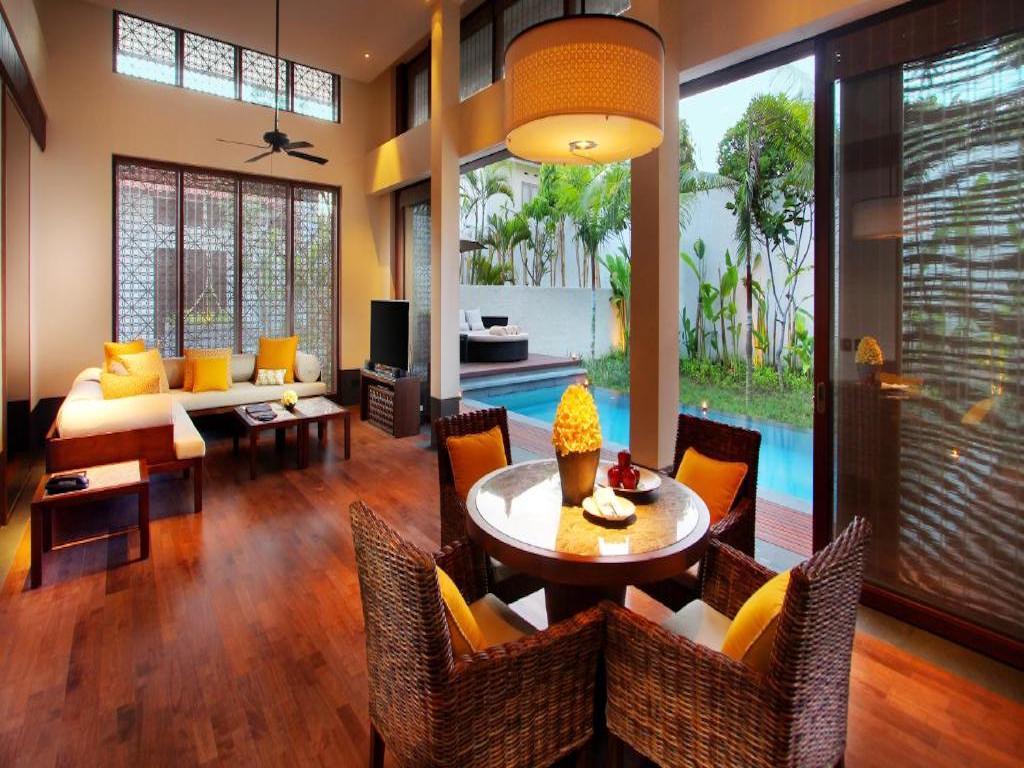 InterContinental Bali Sanur villa with lounge and dining room overlooking the pool 