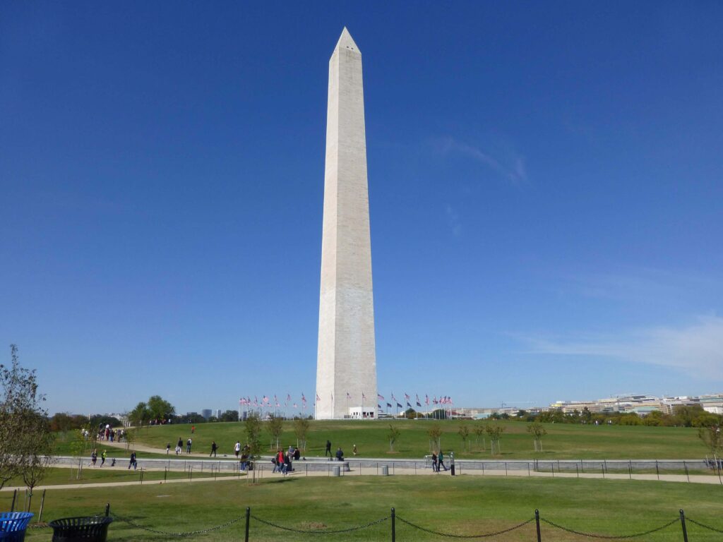 one word instagram captions about travel monument washington dc blue sky