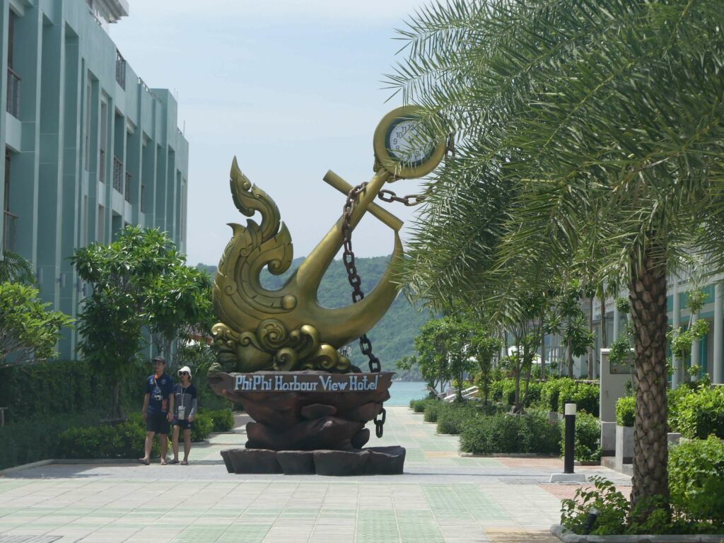 anchor statue in koh phi phi in town where taxis grab and other public transport does not exist