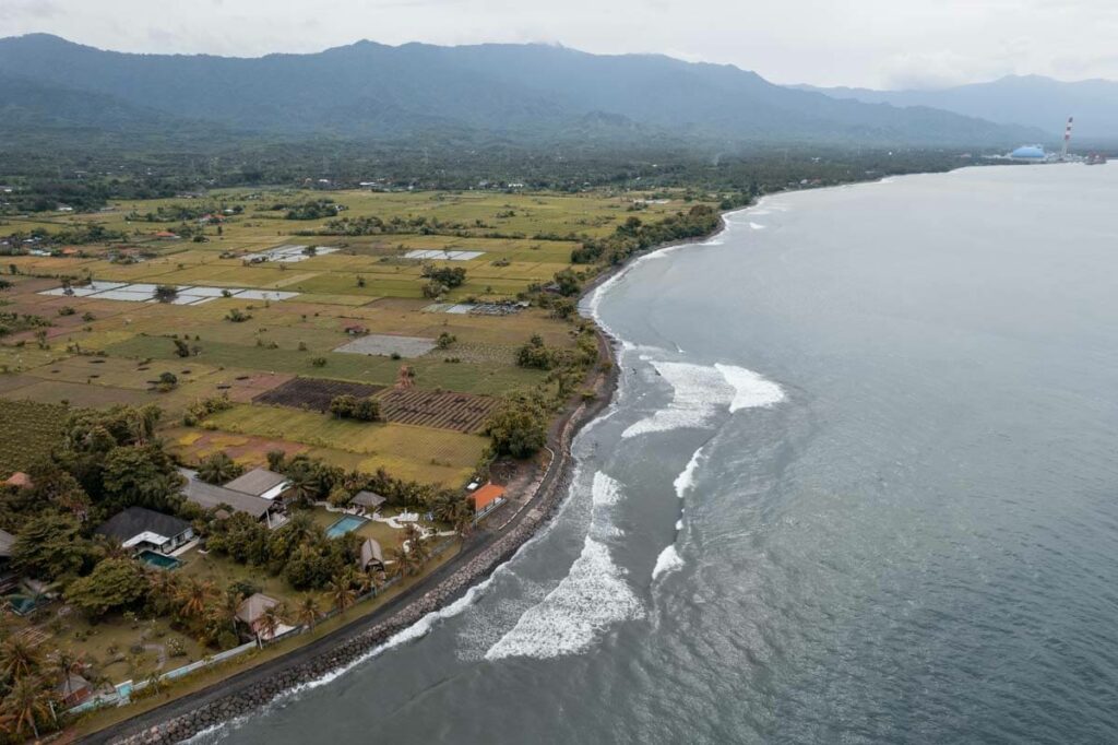 coastline of Lovina in north Bali drone shot beach