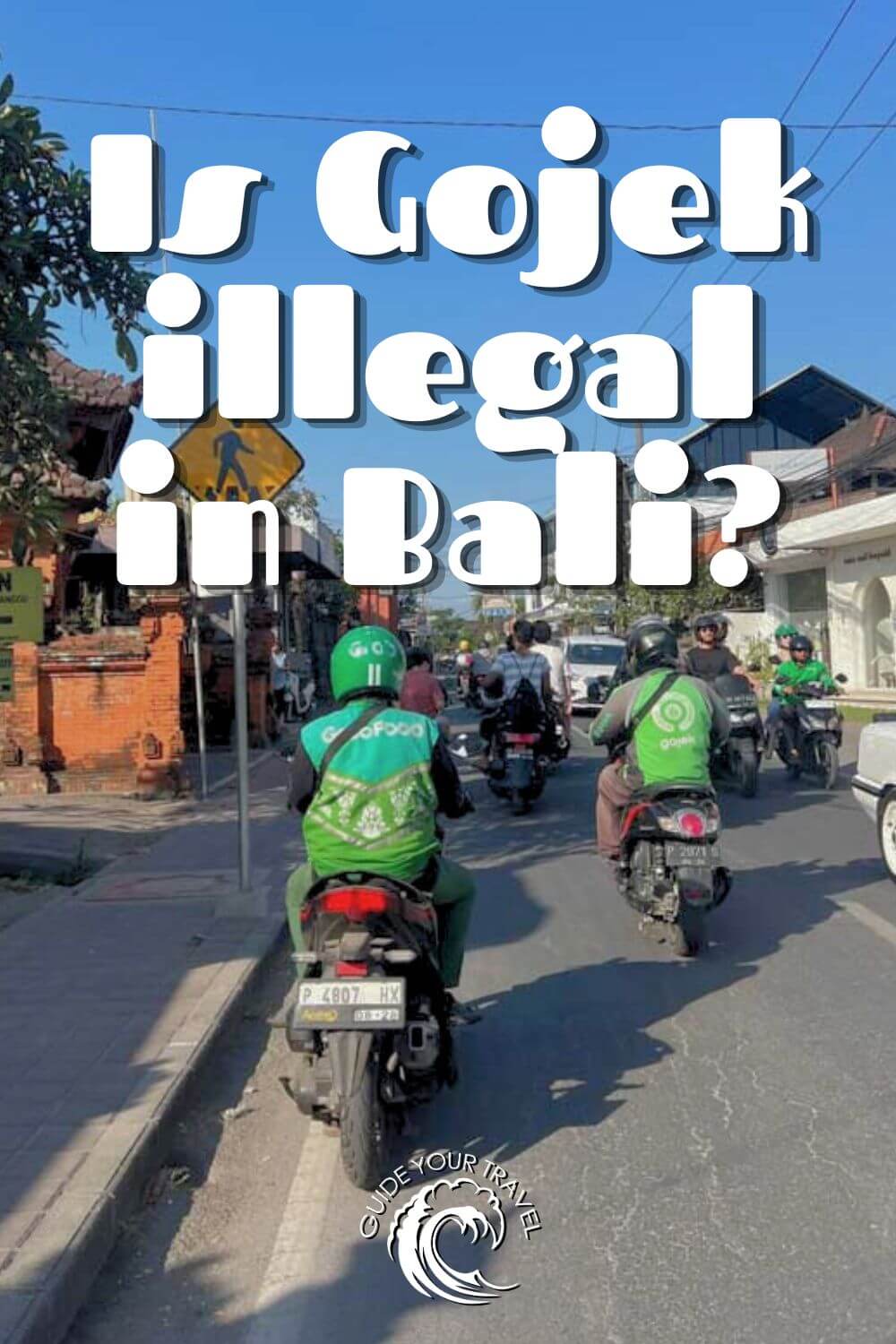 gojek grab illegal in bali driver on scooter with green jacket and helmet