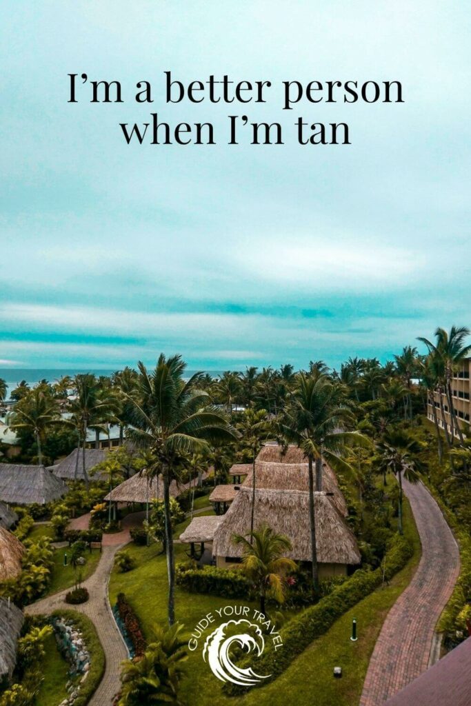 A tropical resort surrounded by palm trees. Island quotes and captions for Instagram