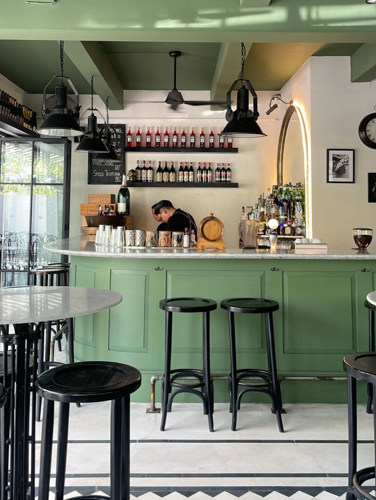 riviera bistro berawa green bar counter bar chairs and bar tender romantic restaurants in canggu italian