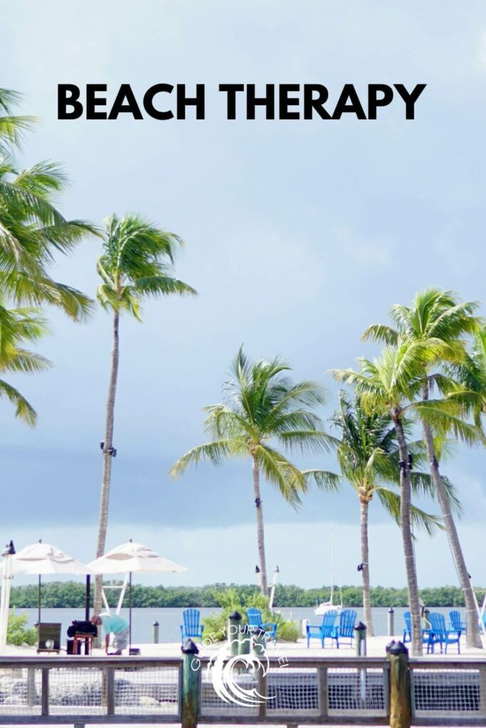 Tall palm trees line a beachfront area. Key West Instagram captions and quotes