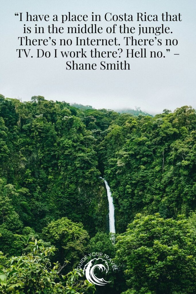 A waterfall cascading through a lush jungle Costa Rica Instagram captions and quotes