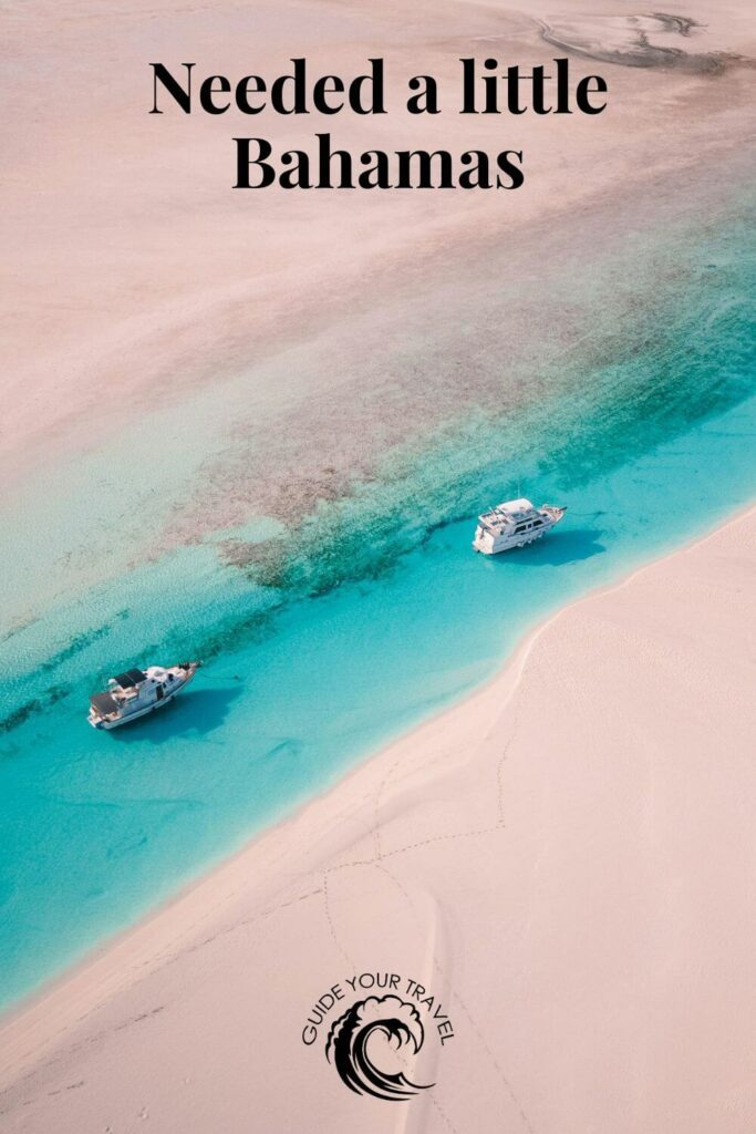 Two boats in clear turquoise water in the bahamas which are perfect for instagram captions and quotes