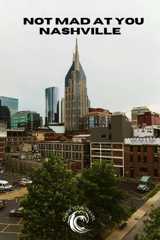 A tall building with surrounding cityscape perfect for Nashville Instagram captions and quotes