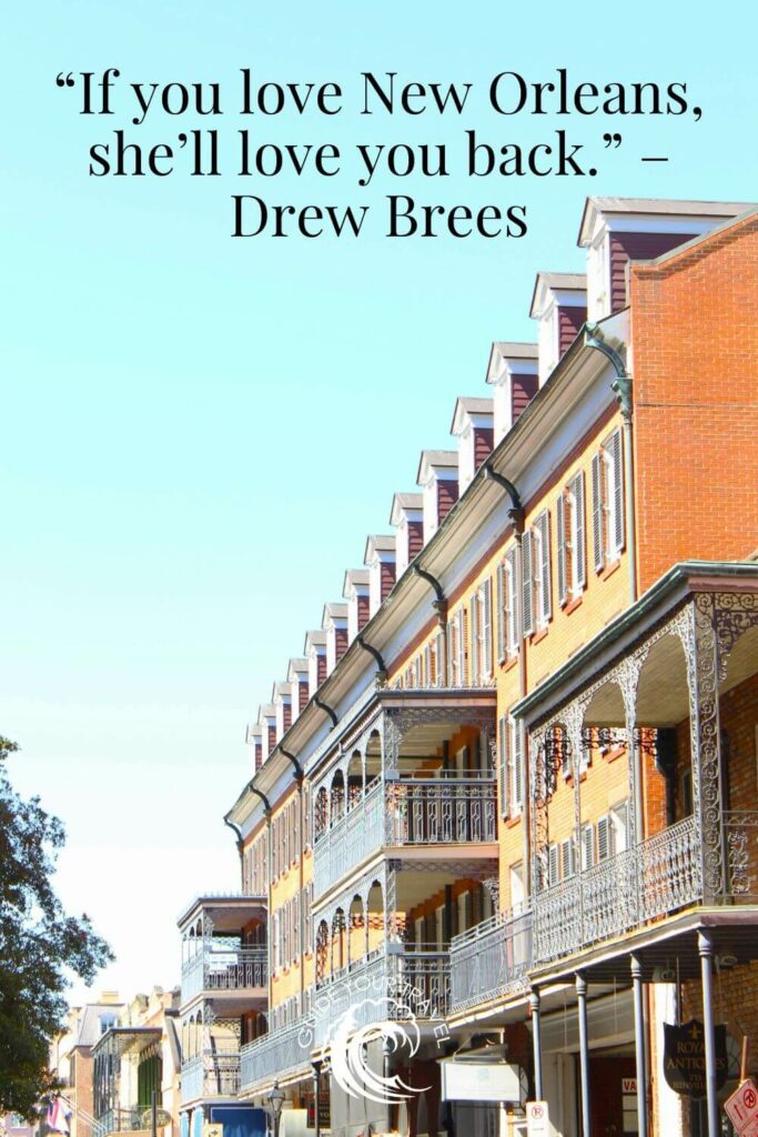 A row of buildings with balconies and ironwork perfect for New Orleans Instagram captions and quotes