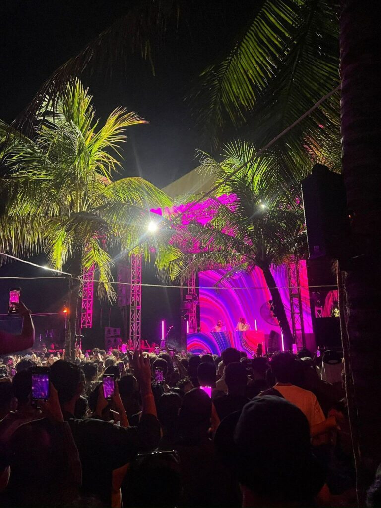 the lawn party performance nen lights palm trees beach clubs canggu