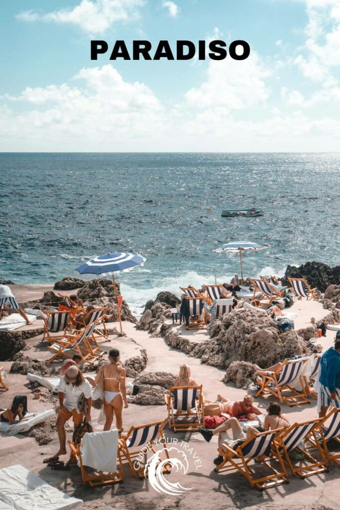 Sunbathers relaxing by the sea perfect for Italy Instagram Captions and Quotes