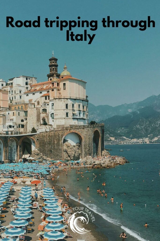 Beach umbrellas and a coastal town perfect for Italy Instagram Captions and Quotes