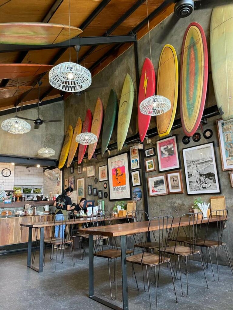 Canteen Cafe interior with surfboards on the wall