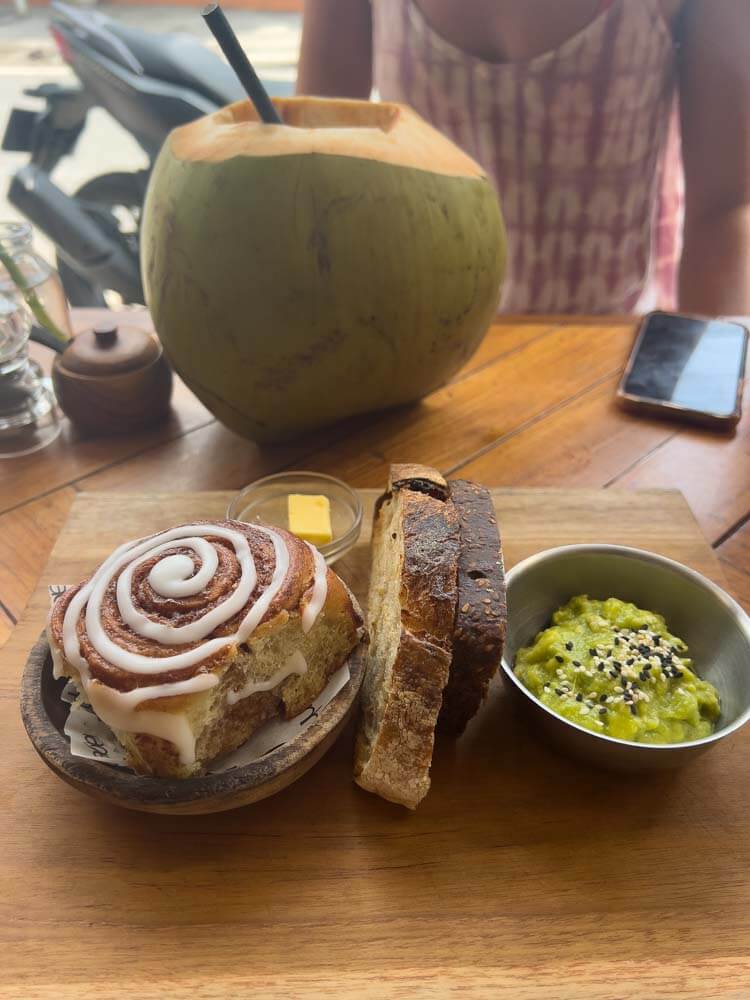 copenhagen brunch cafe in canggu with cinamon rolls and coconuts