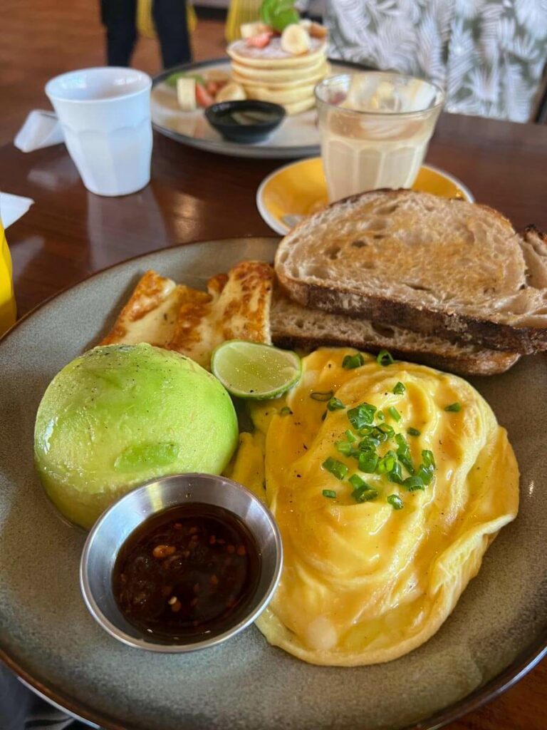 Machinery Cafe breakfast spread with egg and toast