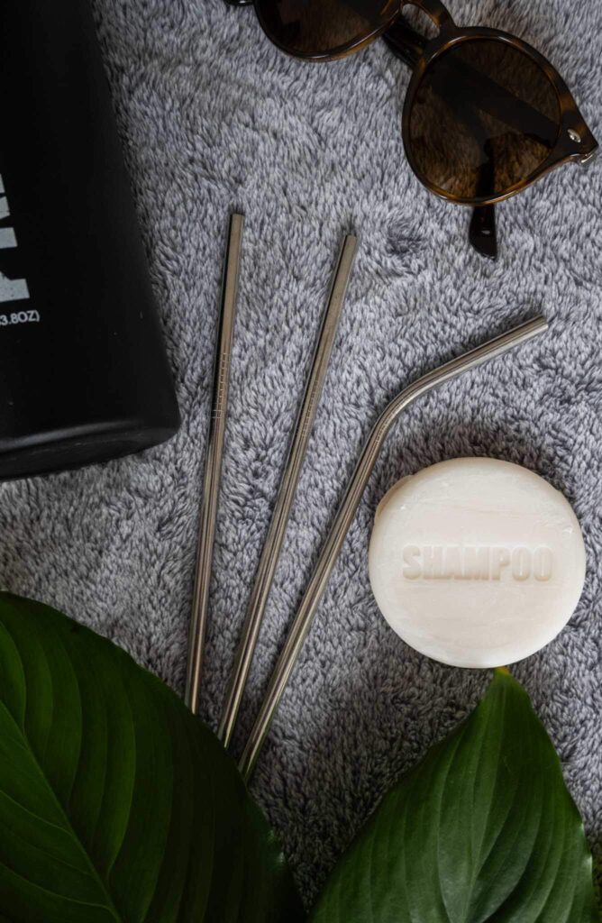 solid shampoo metal straws and water bottle