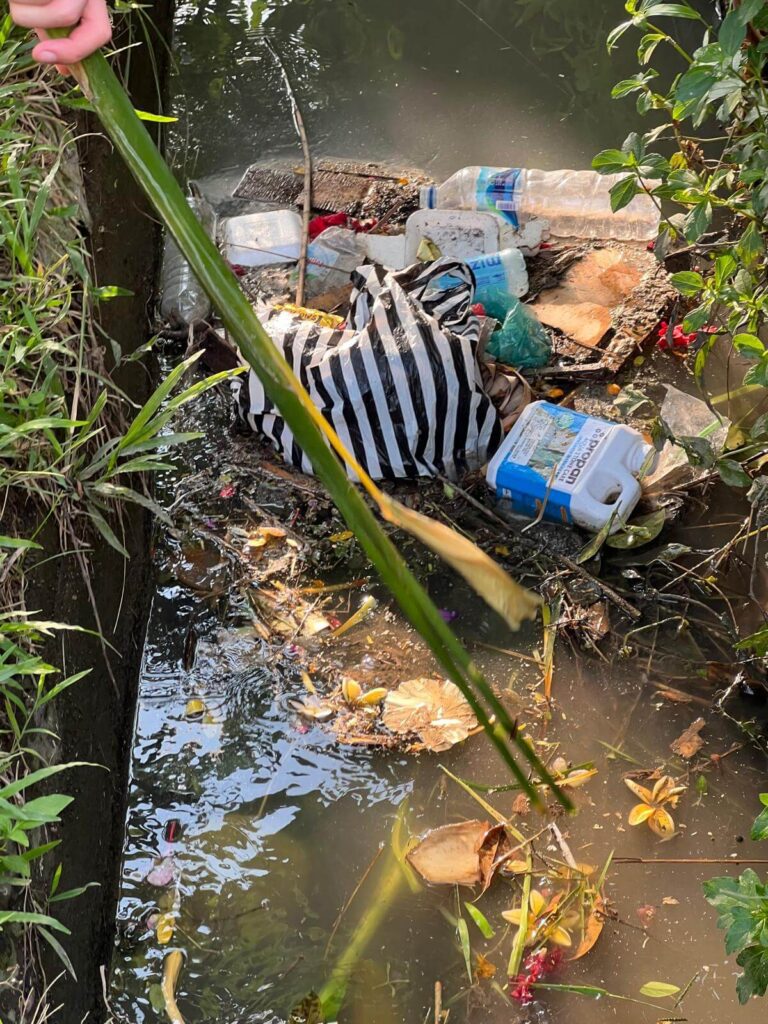 river with plastic trash